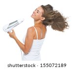 Happy Young Woman Blow Dry