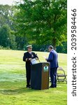 Small photo of CUMMING, GEORGIA - September 10, 2021: A memorial service commemorating the 20th anniversary of the terrorist attacks on nine-eleven is held in Fowler Park in Cumming, Georgia.