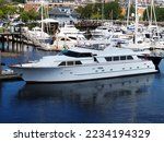Large Yacht At Dock With Many Others In Berths At Marina Boston Harbor Massachusetts