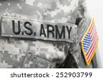 USA flag and US Army patch on solder's uniform