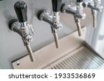 beer tap. a pint of beer. | Shutterstock . vector #1933536869
