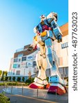 Small photo of Full size Gundam Performances Outside DiverCity Tokyo Plaza, Odaiba, Tokyo, Japan - 27 November 2015: It is 18m tall The sculpture of famous anime franchise robot, Gundam.