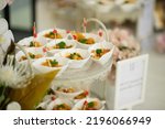Small photo of catering food, dessert and sweet, mini canapes, snacks and appetizers, food for the event, sweetmeat