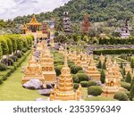 Small photo of Pattaya, Thailand - August 27nd 2023: The French Garden and Dinosaur Park at Nong Nooch Wonder World at Pattaya, Thailand. Nong Nooch is a large park with gardens, flowers, architecture and animals.