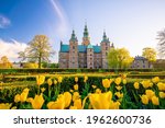 Rosenborg Castle Gardens in Copenhagen, Denmark with blue sky