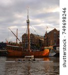 Small photo of Coxless four and coxless pair passing replica of caravel 'Matthew', moored at Wapping Wharf, Bristol Harbour, UK. 29Oct17.