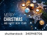 Christmas background with festive decoration  and text - Merry Christmas and Happy New Year. 