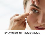 Contact Lens For Vision. Closeup Of Female Face With Applying Contact Lens On Her Brown Eyes. Beautiful Woman Putting Eye Lenses With Hands. Opthalmology Medicine And Health. High Resolution 