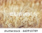 word healthy living. gold wheat ... | Shutterstock . vector #660910789