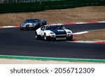 Small photo of Italy, september 11 2021. Vallelunga classic. Historic race De Tomaso Pantera and Ford GT40 cars challenging on asphalt racetrack