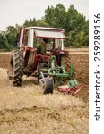 Small photo of BASINGSTOKE, UK OCTOBER 12, 2014: Michael Holloway competing in the second day of the British National Ploughing Championships organised by the Society of Ploughmen. Accredited photographer