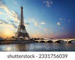 Small photo of Eiffel Tower and bridge Iena on the river Seine in Paris, France.