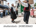 Small photo of Dora (Dhora), Limassol District, Cyprus - May 28, 2023: Folk dancers performing at Dora's Revival Festival