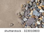 Pebbles On Beach Background