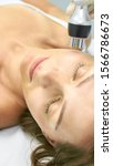 Small photo of Dermatology skin care facial therapy. Medical spa anto wrinkles procedure. Woman face rejuvenation. Pretty girl. Rf cosmetician equipment.