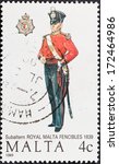 Small photo of MALTA - CIRCA 1989: A stamp printed in Malta shows full dress uniform of subaltern royal malta fencibles in 1839, circa 1989