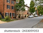 Small photo of Leesburg. Virginia. USA. may 10, 2022 Ancient brick houses, stone pavements.An ancient American city in Virginia with traditional architecture. Ancient bric