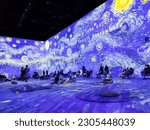 Small photo of Singapore - 19 May 2023: Large colorful projected display of Van Gogh arts on the wall in the Van Gogh Immersive Experience Exhibition. It is a digital art exhibit of the Vincent van Gogh.