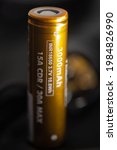 Small photo of The golden INR18650 3.7V rechargeable battery. INR18650 battery is Lithium nickel rechargeable battery with size 18mm by 65mm.