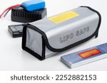 Small photo of LiPo Battery Fireproof Safety Bag and LiPo Battery or Lithium Polymer Battery. This battery type sould be store in safety bag at room tempurature for longest life.