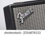 Small photo of BANGKOK, THAILAND - JUNE 13, 2023: Close up the Fender badge on Fender Indio bluetooth speaker. Fender is an American musical instruments manufacturer.