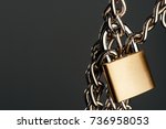 abstract stainless steel chain and padlock, security concept