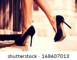 Woman legs in high heel shoes...