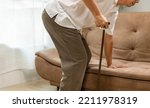 Small photo of Caregiver takecare older man that having Sarcopenia or muscle loss. Sarcopenia is a degenerative disease of the muscle usually caused by the natural consequence of aging.