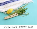 Small photo of Jewish festival of Sukkot. Traditional symbols (The four species): Etrog (citron), lulav (palm branch), hadas (myrtle), arava (willow)