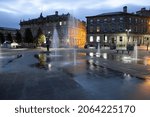 Small photo of HUDDERSFIELD, UK - OCTOBER 26, 2021: The water fountains in front of the Huddersfield train station in the early morning, Kirklees, West Yorkshire