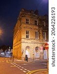 Small photo of HUDDERSFIELD, UK - OCTOBER 26, 2021: The Victorian classical buildings close to Huddersfield train station in the early morning, Kirklees, West Yorkshire