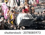 Small photo of KARACHI, PAKISTAN - NOV 20: View of venue after fire eruption incident in a slum due to unknown reasons, nearby Lyari Expressway road located Teen Hatti area on November 20, 2021 in Karachi.