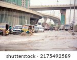 Small photo of KARACHI, PAKISTAN - JUL 06: Stagnant rainwater after downpour of monsoon due to poor sewerage system, creating problems for residents, showing negligence of authorities, on July 06, 2022 in Karachi.