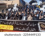 Small photo of RAWALPINDI, PAKISTAN - JAN 26: Members of PSMA are holding protest demonstration for strongly condemned the abhorrent act of desecration of the Holy Quran in Sweden, on January 26, 2023 in Rawalpindi.