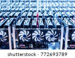 Bitcoin mining farm. IT hardware. Electronic devices with fans. Cryptocurrency miners.