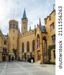 Small photo of Hohenzollern Castle or Burg, Germany, Europe. This castle on mountain top is historical landmark in Stuttgart vicinity, great German monument. Famous Gothic castle like palace in summer.