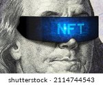 NFT token and money, Franklin on 100 dollar bill with cyber glasses for crypto art. NFT is non-fungible cryptocurrency. Concept of blockchain, marketplace, virtual cryptography, usd, news and safety.