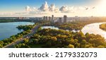 Panorama of Moscow at sunset, Russia. Nice landscape, scenery of city park and Strogino district in Moscow northwest. Aerial panoramic view of Moskva River bays. Scenic Moscow skyline in summer. 