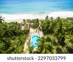 Small photo of Sea beach, coconut palm trees and hotel pool, Sri Lanka. Aerial view of scenic resort, landscape of seashore with houses in jungle. Travel, vacation, rainforest, ocean and nature concept.