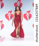 Small photo of New York, NY - February 7, 2019: Jordyn Woods wearing dress by Population walks runway for Red Dress Collection 2019 Go Red for Women at Hammerstein ballroom