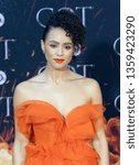 Small photo of New York, NY - April 3, 2019: Nathalie Emmanuel wearing dress by Ermanno Scervino attends HBO Game of Thrones final season premiere at Radio City Music Hall