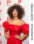 Small photo of New York, NY - February 5, 2020: Jackie Cruz wearing dress by Leanne Marshall attends The American Heart Association's Go Red For Women Red Dress Collection 2020 at Hammerstein Ballroom