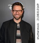 Small photo of New York, NY - March 21, 2022: Tim Federle attends special screening of Disney's "Better Nate Than Ever" at AMC Empire Theater
