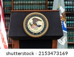 Small photo of New York, NY - May 5, 2022: Seal of Justice Department seen during press conference at US Attorney Office library announcing extradiction of Otoniel from Colombia