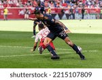 Small photo of Geoff Cameron (20) of FC Cincinnati tuckles Lucas Lima Linhares (82) of Red Bulls during Audi 2022 MLS Cup playoffs round one at Red Bull Arena on October 15, 2022