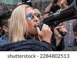 Small photo of Congresswoman Marjorie Taylor Greene attends pro-Trump supporters rally at New York criminal court on April 4, 2023 during appearance by Former President Donald Trump Jr.