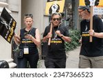 Small photo of Samantha Mathis, Griffin Dunne join WGA and SAG-AFTRA members to walk picket lines as they strike over contract negotiation at Netflix and Warner Bros. Discovery offices in New York on August 14, 2023
