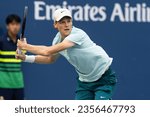 Small photo of Jannik Sinner of Italy returns ball during 3rd round against Stan Wawrinka of Switzerland at the US Open Championships at Billie Jean King Tennis Center in New York on September 2, 2023.