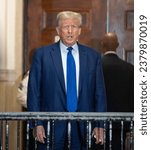 Small photo of Former President Donald Trump addressed media before 2nd day of testimony of Michael Cohen of civil fraud trial at New York State Court on October 25, 2023