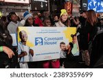 Small photo of People attend sleep out night on Times Square in New York on November 16, 2023 as part of Covenant House annual global event to help raise money for young people facing homelessness